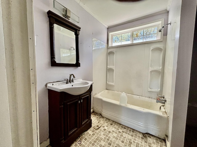 bathroom featuring shower / tub combination, vanity, and ornamental molding