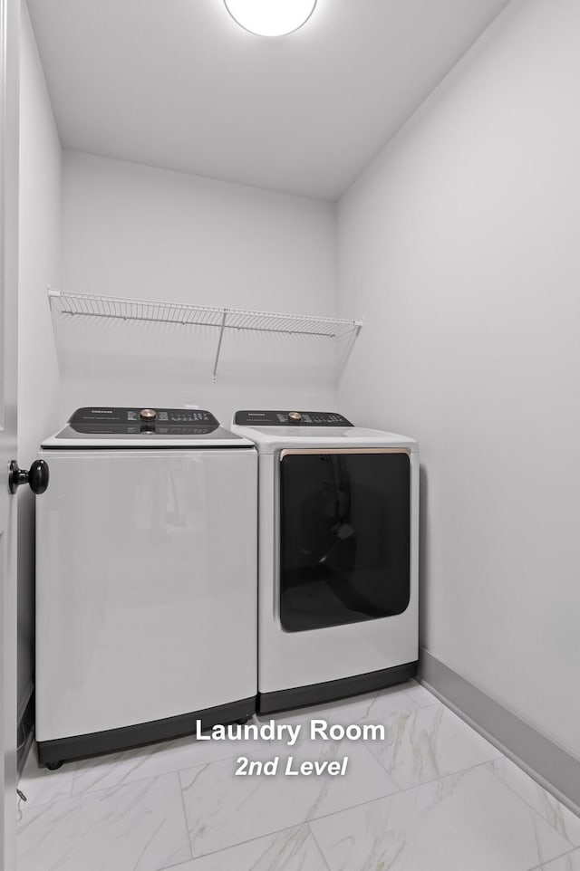 laundry area with washer and dryer