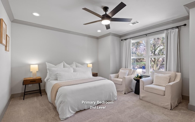 carpeted bedroom featuring ceiling fan and ornamental molding