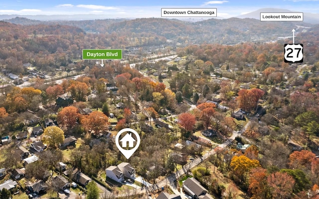 drone / aerial view featuring a mountain view