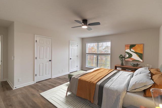 bedroom featuring ceiling fan and hardwood / wood-style flooring