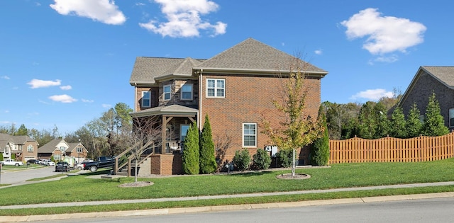 view of front facade featuring a front yard