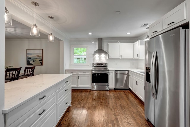 kitchen with white cabinetry, wall chimney exhaust hood, stainless steel appliances, tasteful backsplash, and dark hardwood / wood-style flooring