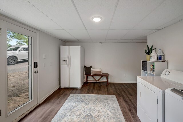 washroom featuring dark hardwood / wood-style flooring and separate washer and dryer