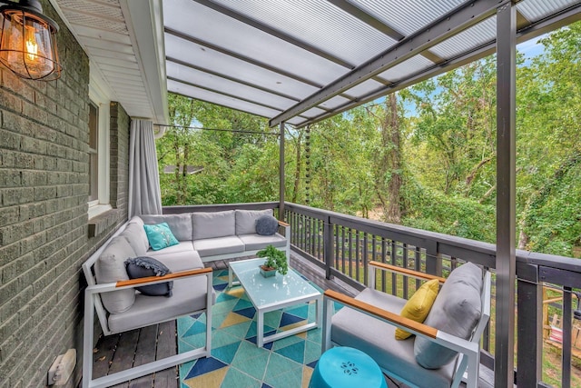 deck with an outdoor hangout area