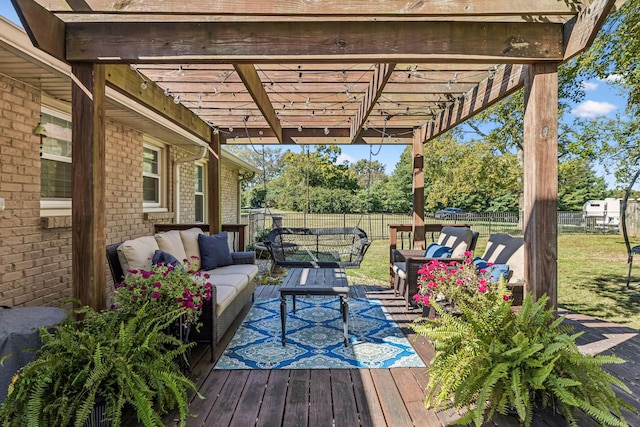 deck with an outdoor hangout area, a pergola, and a lawn