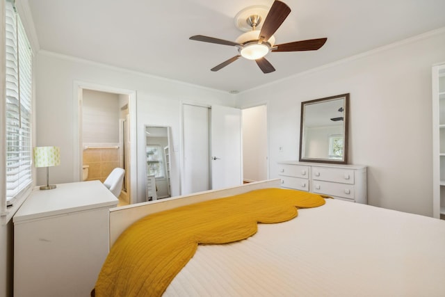 bedroom with connected bathroom, ceiling fan, and crown molding