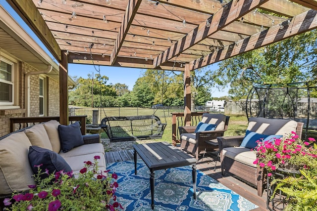 view of patio / terrace with an outdoor living space and a pergola