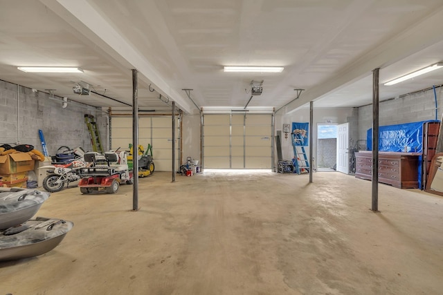 garage featuring a garage door opener