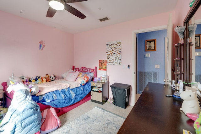 bedroom featuring light tile patterned floors and ceiling fan