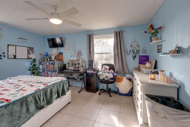 bedroom featuring ceiling fan and light tile patterned flooring