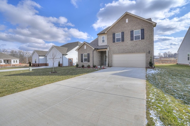 view of front of home featuring a garage and a front yard