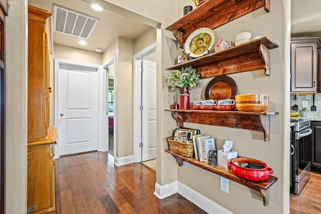 corridor featuring hardwood / wood-style flooring