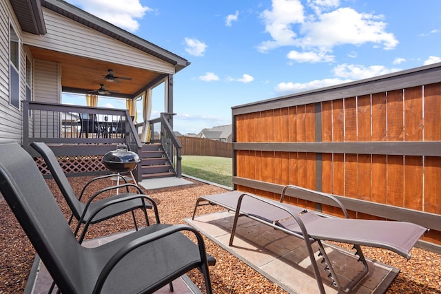 view of patio / terrace featuring a wooden deck and ceiling fan