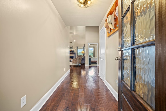 corridor featuring hardwood / wood-style flooring