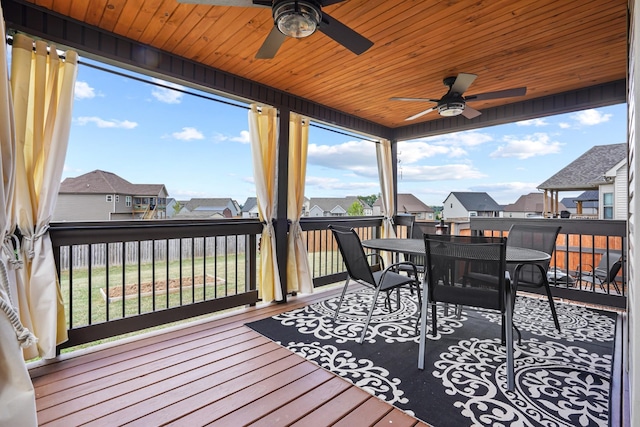 wooden terrace with ceiling fan