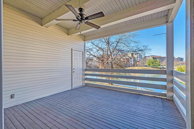 wooden terrace featuring ceiling fan