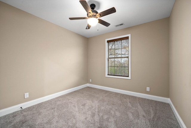 empty room featuring carpet floors