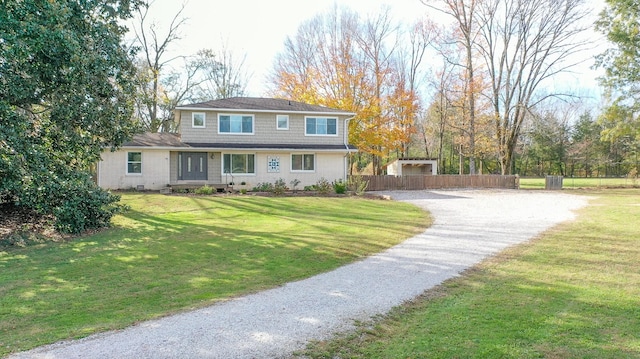 view of front facade with a front lawn