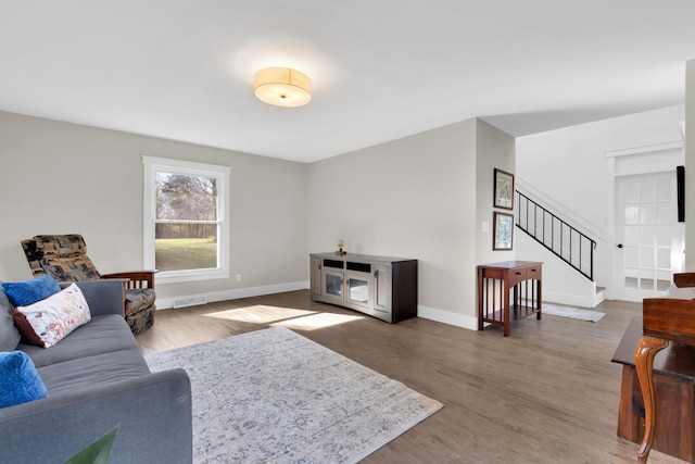 living room featuring dark hardwood / wood-style flooring