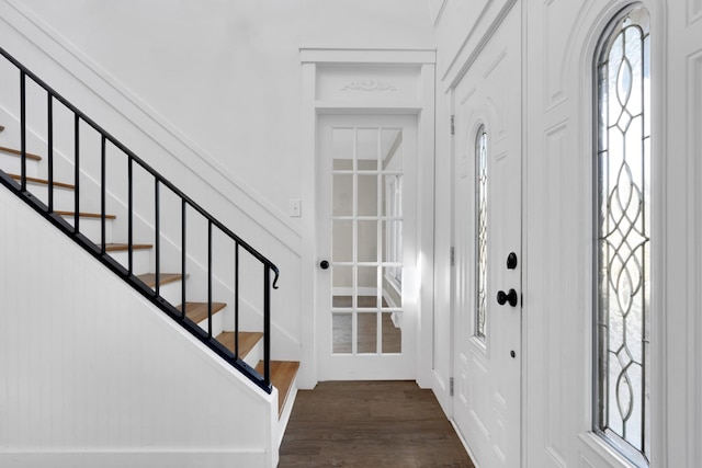 entrance foyer featuring dark hardwood / wood-style floors