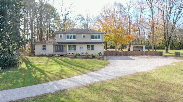 view of front facade with a front lawn