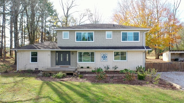 view of front of house with a front yard