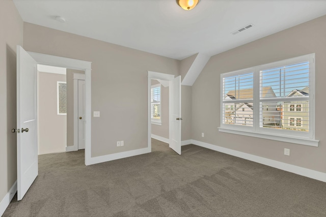 unfurnished bedroom with carpet floors