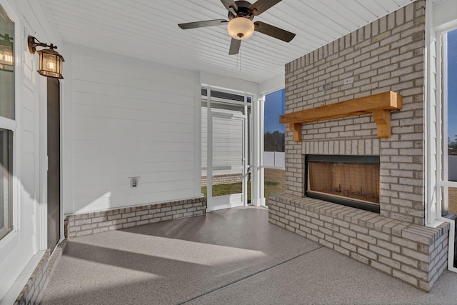 living room featuring ceiling fan, wooden ceiling, and an outdoor brick fireplace