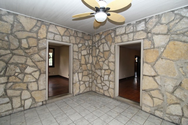 unfurnished room with ceiling fan and light wood-type flooring