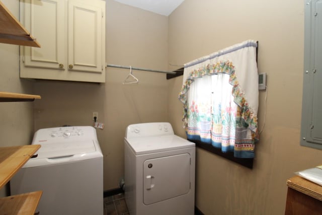 laundry area featuring cabinets and washing machine and dryer