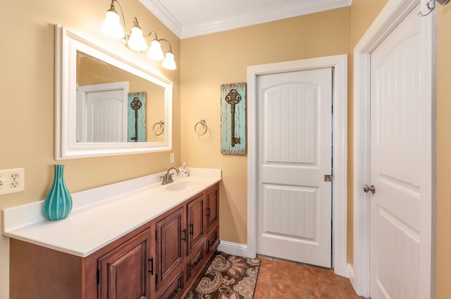 bathroom featuring vanity, tile patterned floors, and ornamental molding