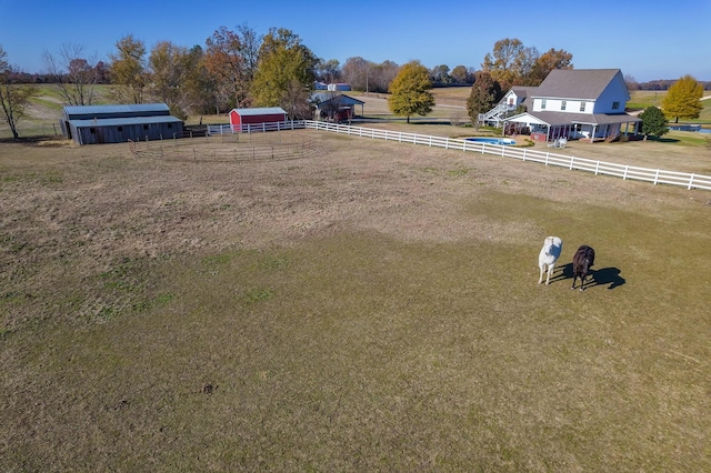 view of yard with a rural view