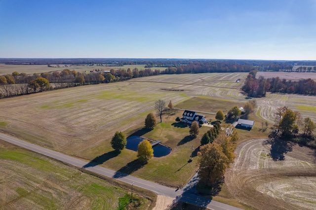 birds eye view of property featuring a rural view