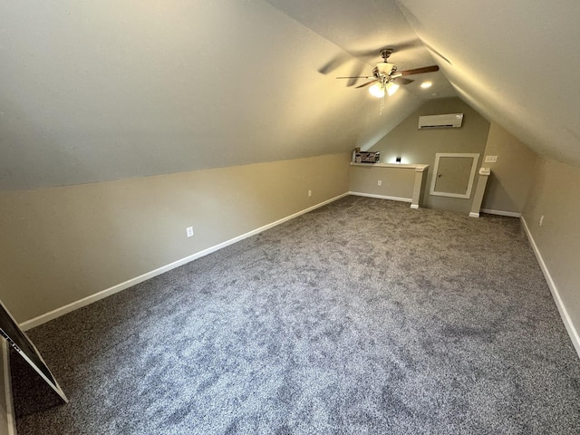 bonus room featuring a wall mounted AC, ceiling fan, carpet floors, and vaulted ceiling