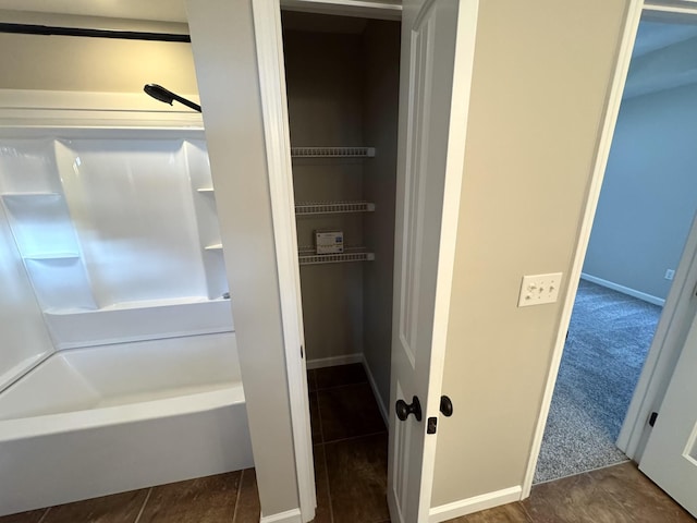 bathroom with hardwood / wood-style flooring