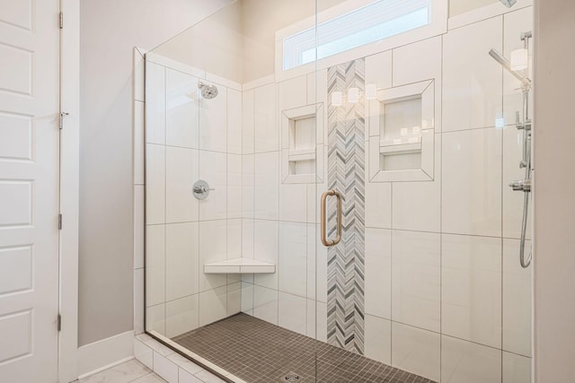 bathroom featuring walk in shower