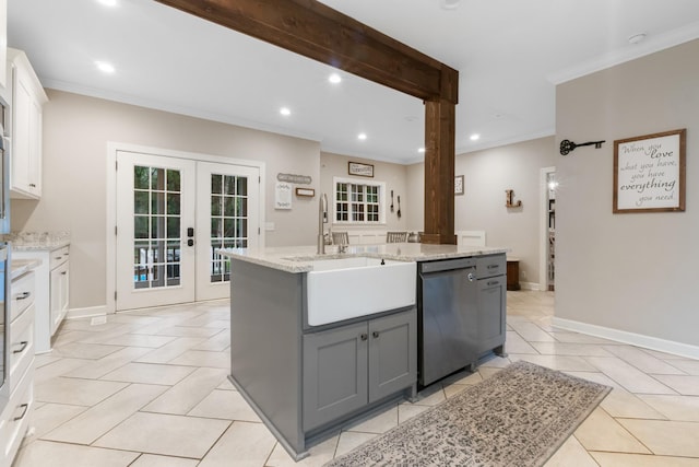 kitchen featuring gray cabinetry, a kitchen island with sink, french doors, stainless steel dishwasher, and white cabinetry