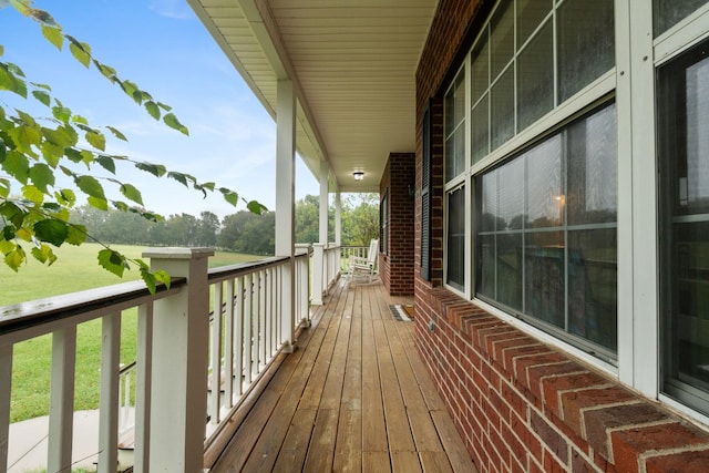 wooden terrace with covered porch