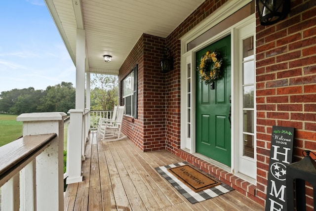 doorway to property featuring a porch