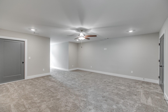 unfurnished room featuring light colored carpet