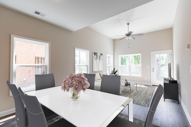 dining space featuring dark hardwood / wood-style floors and ceiling fan