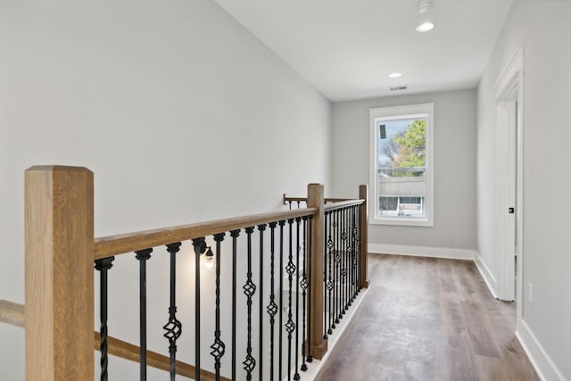 hallway featuring hardwood / wood-style floors