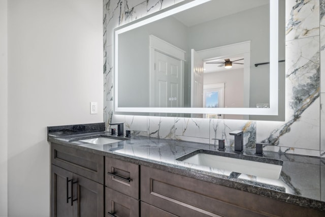 bathroom featuring vanity and ceiling fan