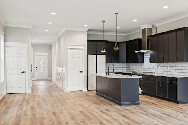 kitchen featuring stainless steel fridge, light wood-type flooring, ornamental molding, range, and hanging light fixtures