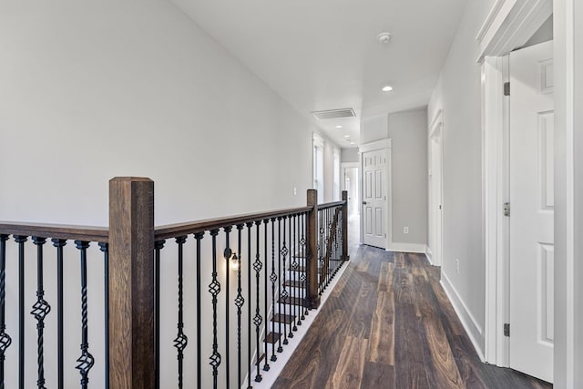 hallway featuring dark hardwood / wood-style floors