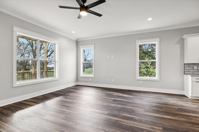 unfurnished living room with dark hardwood / wood-style floors and a healthy amount of sunlight