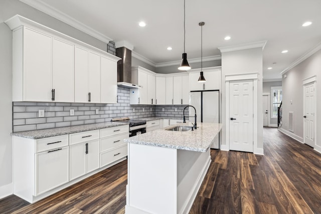 kitchen with stainless steel electric stove, wall chimney range hood, sink, dark hardwood / wood-style floors, and white cabinetry