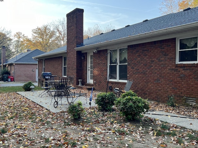 rear view of house featuring a patio area