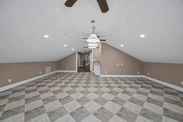 bonus room with ceiling fan and vaulted ceiling